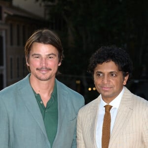 BGUK_2991500 - Rome, ITALY - M. Night Shyamalan and Josh Hartnett attend the photocall of "Trap" in Rome Josh Hartnett wearing Boglioli Milano Pictured: Josh Hartnett, M. Night Shyamalan 