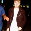 Justin Bieber beau gosse avec sa veste marron