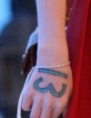 Taylor Swift : bientôt le 13 tatoué sur sa main ?