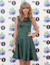 Taylor Swift combat le vent à Londres le 3 novembre 2013