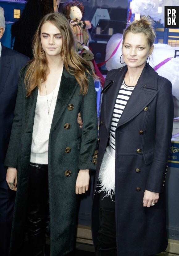 Cara Delevingne et Kate Moss présentes au Printemps pour dévoiler les vitrines de Noël le 6 novembre 2014