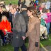 Kate Middleton et le Prince William main dans la main à la messe de Noël de la famille royale le 25 décembre 2014