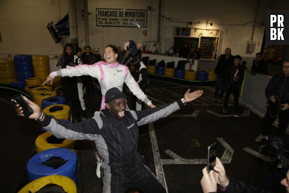 Moussier Tombola et Laury Thilleman en karting pour Une Course pour la Vie, en faveur de l'association Meghanora contre le cancer du rein chez l'enfant, le 8 février 2015 à Wissous