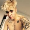 Justin Bieber blond et torse nu sur une photo Instagram