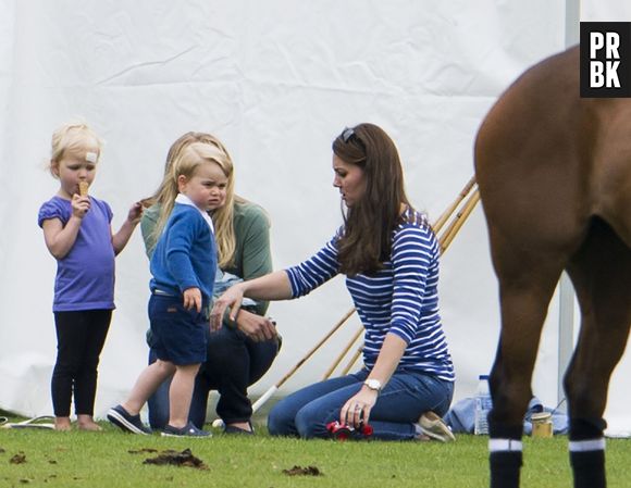 Kate Middleton et le Prince George pendant un match de polo de charité, le 14 juin 2015