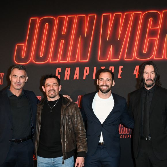 Chad Stahelski, Laurent Demianoff, Vincent Bouillon et Keanu Reeves à la première du film "John Wick : Chapitre 4" au Grand Rex à Paris, France, le 10 mars 2023. © Coadic Guirec/Bestimage 