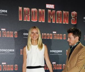 Robert Downey Jr. et Gwyneth Paltrow - Photocall du film "Iron Man 3" au palais Montgelais a Munich. Le 12 avril 2013