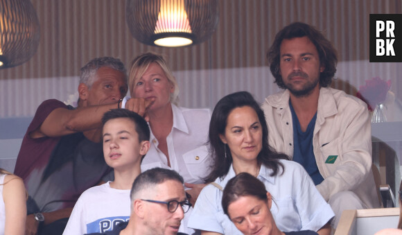 Nagui, Anne-Elisabeth Lemoine, Bertrand Chameroy - Célébrités en tribunes des Internationaux de France de tennis de Roland Garros 2023 à Paris le 11 juin 2023. © Jacovides-Moreau/Bestimage


