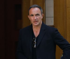 Semi-Exclusif - Nikos Aliagas - Sorties des obsèques de Laurent Vimont (PDG de Century 21) en l'église Notre-Dame de Grâce de Passy à Paris. Le 23 mars 2022
