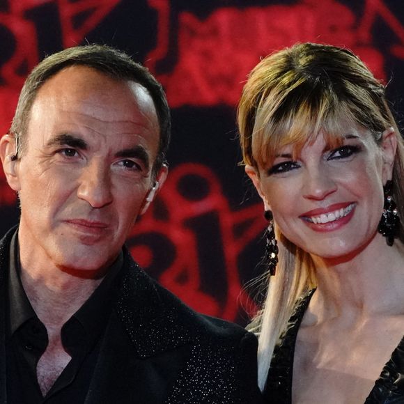 Nikos Aliagas et sa compagne Tina Grigoriou lors de la 23ème édition des NRJ Music Awards 2021 au Palais des Festivals de Cannes, le 20 novembre 2021. 