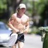 08/27/2023 EXCLUSIVE: Jeremy Allen White shows off his fit physique while on a jog in Los Angeles. The 32 year old American actor when shirtless while taking to the streets for a workout wearing a baseball cap with black shorts, Nike socks and running shoes. 