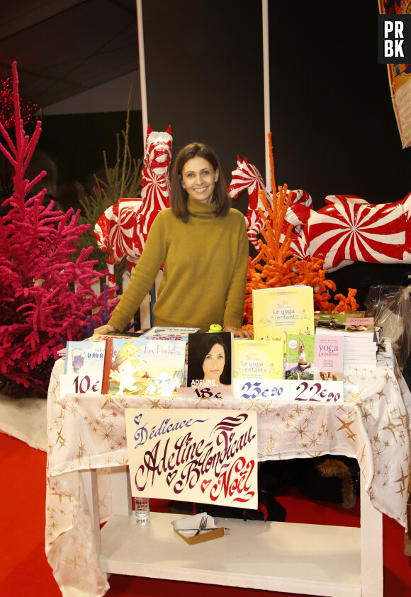 Adeline Blondieau dédicace ses livres dont le dernier "Le yoga des enfants" au marché de Noël de la Défense le 14 Décembre 2019 © Christophe Aubert via Bestimage