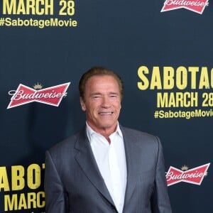 Arnold Schwarzenegger lors de la première du film "Sabotage" au cinéma "The Regal " à Los Angeles, le 19 mars 2014.