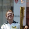 Rupert Grint s'éclate avec la flamme olympique