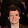 Josh Hutcherson tout sourire pour Hunger Games 2, le 15 novembre 2013 à Paris