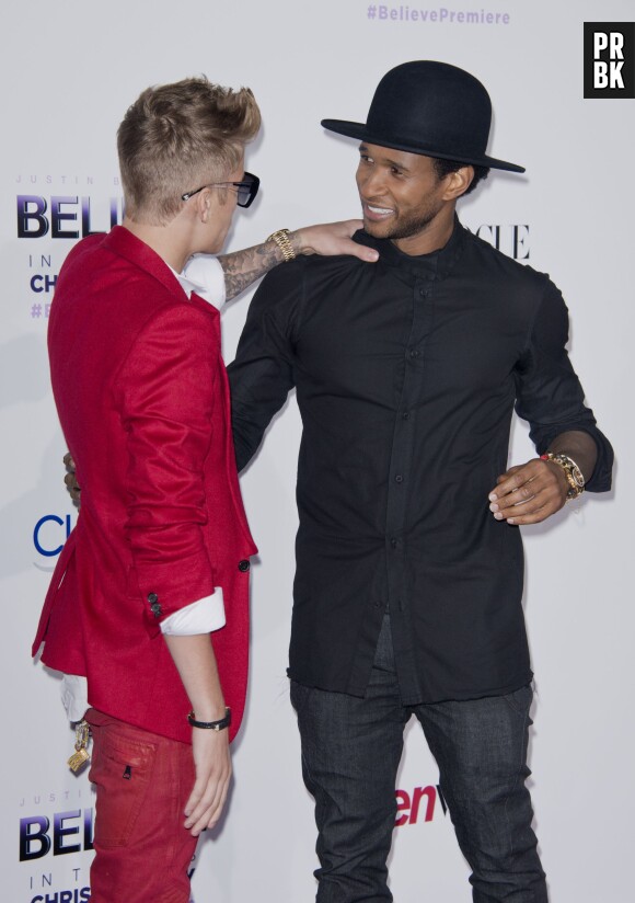 Justin Bieber et Usher sur le tapis rouge du film Believe à Los Angeles, le 18 décembre 2013
