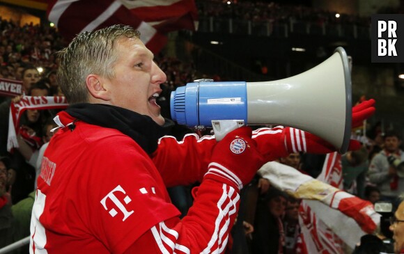 Bastian Schweinsteiger et toute l'équipe du Bayern Munich fêtent leur victoire du championnat de foot allemand, le 25 mars 2014 dans l'Olympiastadion de Berlin