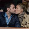 Clovis Cornillac et sa femme dans les tribunes de Roland Garros le 27 mai 2014
