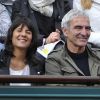 Estelle Denis et Raymond Domenech dans les tribunes de Roland Garros le 27 mai 2014