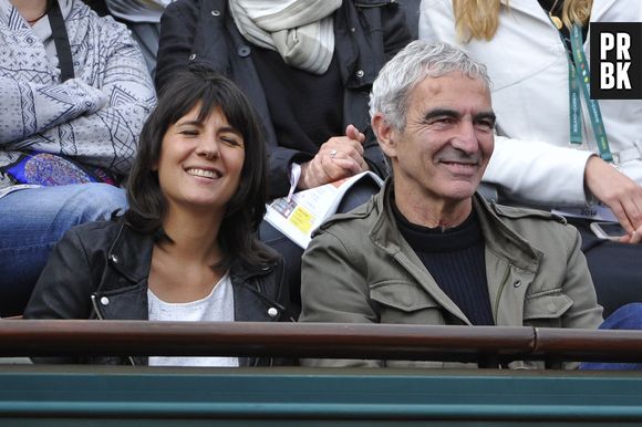Estelle Denis et Raymond Domenech dans les tribunes de Roland Garros le 27 mai 2014