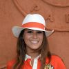 Karine Ferri en orange au village Roland Garros le 27 mai 2014