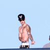 Justin Bieber exhibe son torse nu et ses tatouages à Ibiza, le 30 juillet 2014