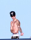  Justin Bieber exhibe son torse nu et ses tatouages &agrave; Ibiza, le 30 juillet 2014 