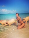  Irina Shayk pose avec des cochons sauvages aux Bahamas 