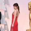 Dakota Johnson sur le tapis rouge des Oscars, le 22 février 2015 à Los Angeles