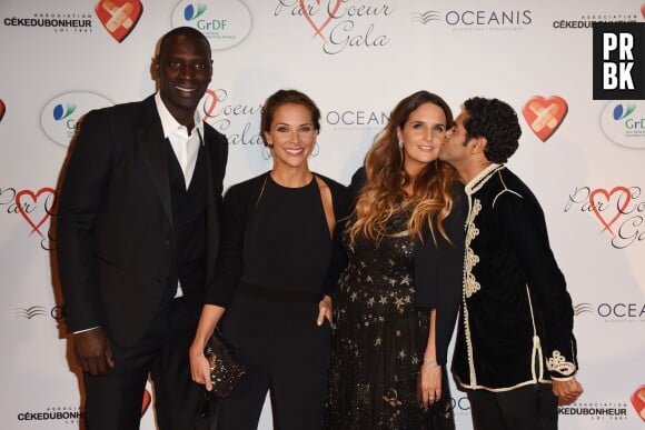 Omar Sy, Mélissa Theuriau, Hélène Sy et Jamel Debbouze sur le tapis rouge du gala Par Coeur au profit de l'association Cé Ke Du Bonheur à Paris, le 24 septembre 2015