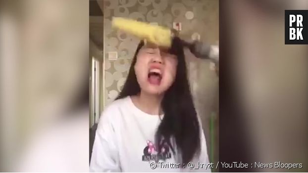 Une chinoise s&#039;arrache les cheveux en mangeant du maïs avec une perceuse