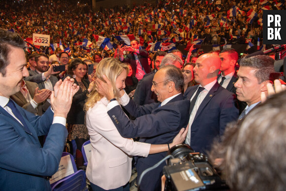 Eric Zemmour, Marion Maréchal (enceinte) - Meeting de Eric Zemmour, candidat à l'élection présidentielle, au Zénith de Toulon le 6 mars 2022. © Photos Création / Panoramic / Bestimage  France's far-right party Reconquete! leader and candidate for the 2022 presidential election Eric Zemmour acknowledges the audience flanked by French far-right politician Marion.Marechal during a campaign meeting in Toulon, southern France on March 6, 2022. The niece of Marine Le Pen, Marion Maréchal, has officially joined Reconquete! leader and candidate for the 2022 presidential election Eric Zemmour on March 6, 2022 