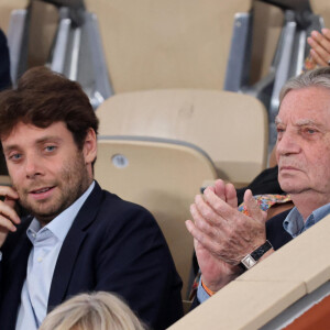 Patrice Duhamel et son fils Benjamin en tribune (jour 13) lors des Internationaux de France de Tennis de Roland Garros 2022 à Paris, France, le 3 juin 2022. © Dominique Jacovides/Bestimage 