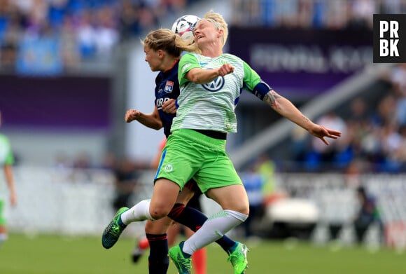 Wolfsburg's Nilla Fischer (right) and Olympic Lyonnais' Ada Hegerberg battle for a header ... Wolfsburg v Lyon - UEFA Women's Champions League - Final - Valeriy Lobanovsky Dynamo Stadium, Kiev, Ukraine, May 24, 2018. Photo by Mike Egerton/EMPICS Sport/ABACAPRESS.COM 