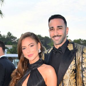 Adil Rami et sa compagne Léna Guillou - 9ème gala étoilé Patrick Mouratoglou (coach légendaire de S. Williams) au profit de la Fondation Champ'seed à la Mouratoglou Academy afin de soutenir les jeunes espoirs du tennis mondial à Biot le 18 juin 2023. Un dîner était organisé autour de l'iconique piscine en forme de raquette, suivi d'une vente aux enchères avec des lots prestigieux dont une heure d'entrainement en compagnie de M. Tyson. 