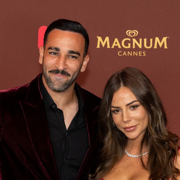 Adil Rami et sa compagne Léna Guillou - Soirée sur la plage Magnum lors du 76ème Festival International du Film de Cannes le 22 mai 2023. © Cannes Magnum/Jeremy Melloul/Bestimage 