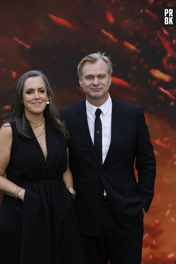 London, UNITED KINGDOM - Cast walk the 'charred' black carpet at tonight's premiere Pictured: Christopher Nolan