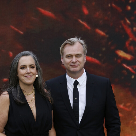 London, UNITED KINGDOM - Cast walk the 'charred' black carpet at tonight's premiere Pictured: Christopher Nolan