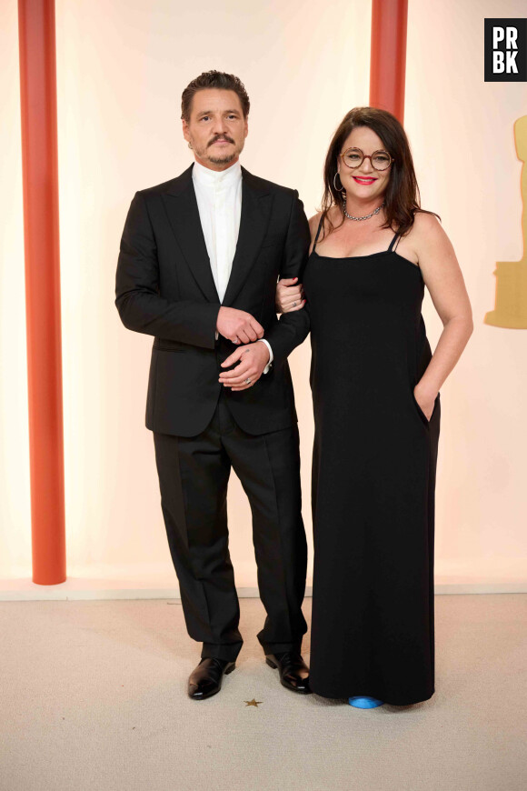 Pedro Pascal et Javiera Balmaceda - Photocall de la 95ème édition de la cérémonie des Oscars à Los Angeles. Le 12 mars 2023