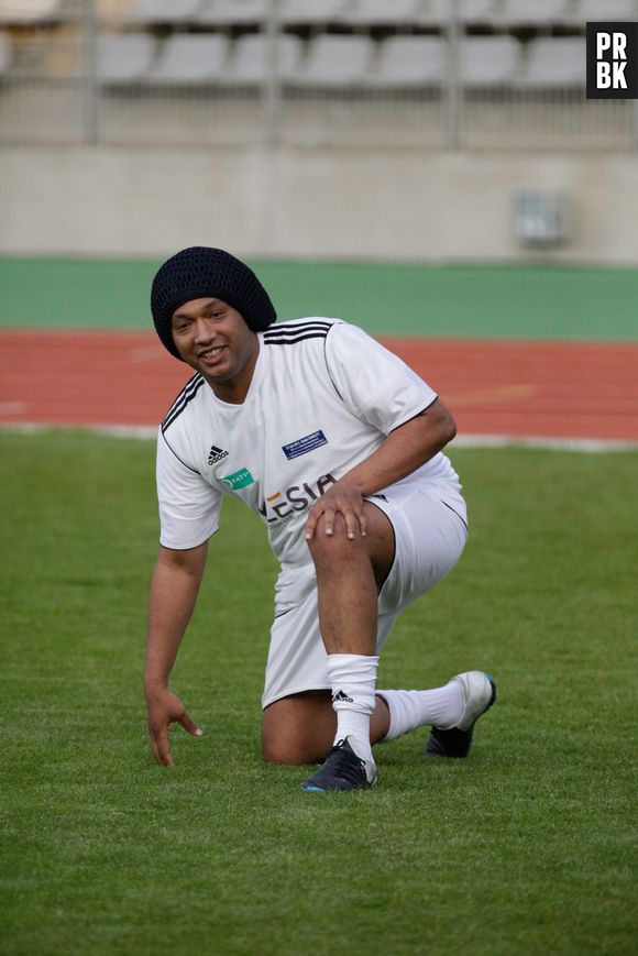 M. Pokora et le Variétés Club De France de football contre la sélection républicaine composée de ministres, anciens ministres et députés au Stade Charlety, Paris, France le 25 juin 2013.
