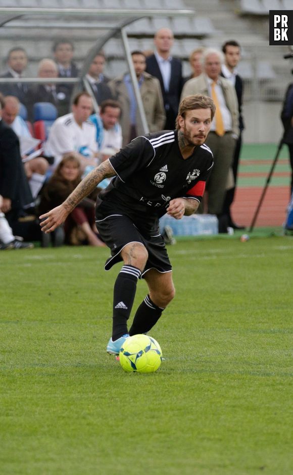 M. Pokora et le Variétés Club De France de football contre la sélection républicaine composée de ministres, anciens ministres et députés au Stade Charlety, Paris, France le 25 juin 2013.