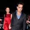 Johnny Depp et Amber Heard n'ont pas caché leur complicité, le 21 juillet 2013 à Londres