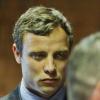 Oscar Pistorius face au tribunal de Pretoria suite à la mort de Reeva Steenkamp, le 19 août 2013