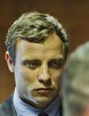 Oscar Pistorius face au tribunal de Pretoria suite à la mort de Reeva Steenkamp, le 19 août 2013