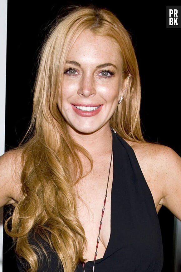 Lindsay Lohan tout sourire pendant la soirée Purple, le 11 septembre 2013 à New York