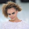 Cara Delevingne lors du défilé Chanel pour la Fashion Week de Paris le 21 janvier 2014