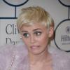 Miley Cyrus enchaîne les grimaces lors d'une soirée pré-Grammy Awards le 25 janvier 2014
