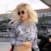 Rita Ora en total look American Express, à Los Angeles le 7 février 2014