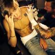 Justin Bieber montre l'un de ses nouveaux tatouages sur Instagram le 30 novembre 2013