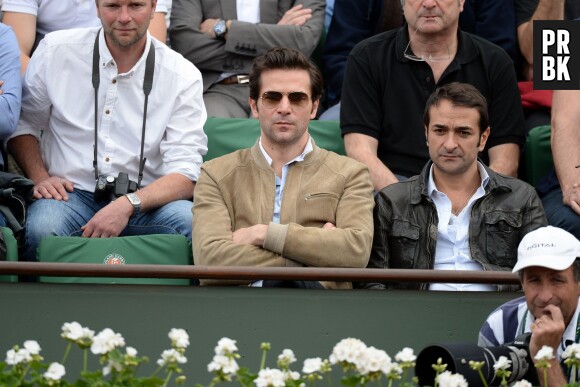 Grégory Fitoussi suit attentivement un match à Roland Garros, le 30 mai 2014